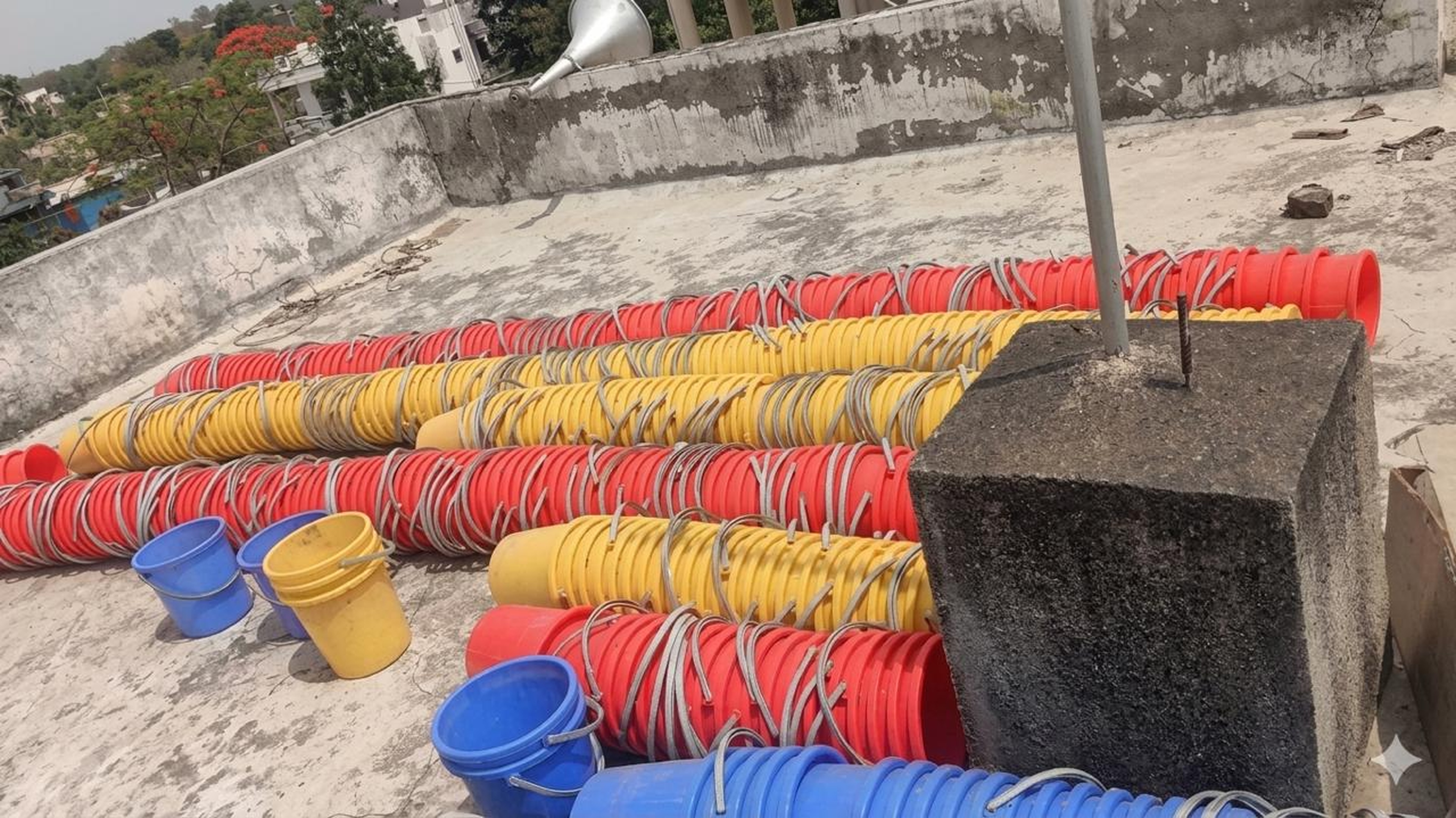 Water buckets distribution — village water supply initiative, Arangaon